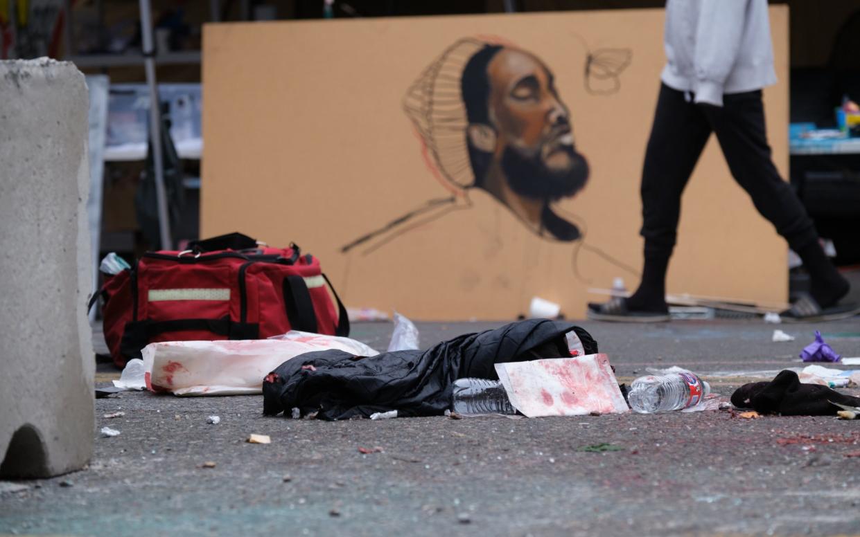 Used medical supplies are left behind at the site of a fatal shoooting, in which at least one person was killed after a car rammed a concrete barricade at the Capitol Hill Occupied Protest - STEPHEN BRASHEAR/EPA-EFE/Shutterstock/Shutterstock