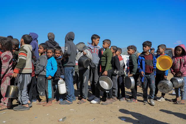 Palestinians line up on Feb. 9 for relief food supplies in the southern Gaza Strip city of Rafah. The United Nations Relief and Works Agency for Palestine Refugees in the Near East (UNRWA) said Israel has rejected half of the aid requests it has submitted for northern Gaza.