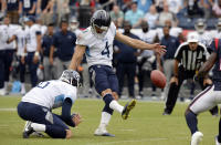 Tennessee Titans kicker Ryan Succop (4) kicks a 31-yard field goal against the Houston Texans as Brett Kern (6) holds in the second half of an NFL football game Sunday, Sept. 16, 2018, in Nashville, Tenn. The kick proved to be the winning points as the Titans won 20-17. (AP Photo/Mark Zaleski)