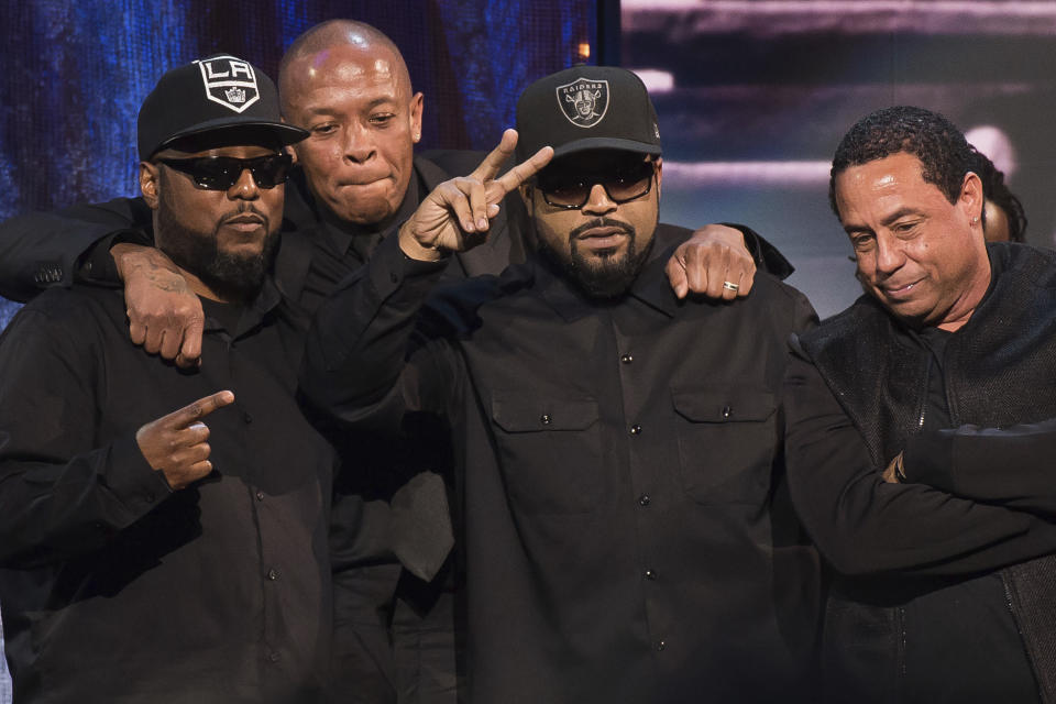 FILE - In this April 8, 2016, file photo, inductees MC Ren, from left, Dr. Dre, Ice Cube and DJ Yella from N.W.A appear at the 31st Annual Rock and Roll Hall of Fame Induction Ceremony at the Barclays Center in New York. In the five decades since hip-hop emerged out of New York City, it has spread around the country and the world. And at each step there's been change and adaptation, as new, different voices came in and made it their own. Some in hip-hop pulled no punches, using the art form and the culture as a no-holds-barred way of showcasing the troubles of their lives. Often those messages have been met with fear or disdain in the mainstream. When N.W.A. came “Straight Outta Compton” in 1988 with loud, brash tales of police abuse and gang life, radio stations recoiled. (Photo by Charles Sykes/Invision/AP, File)