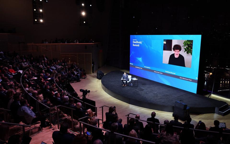 Andrew Ross Sorkin speaks with FTX founder Sam Bankman-Fried during the New York Times DealBook Summit - Michael M. Santiago/Getty Images North America