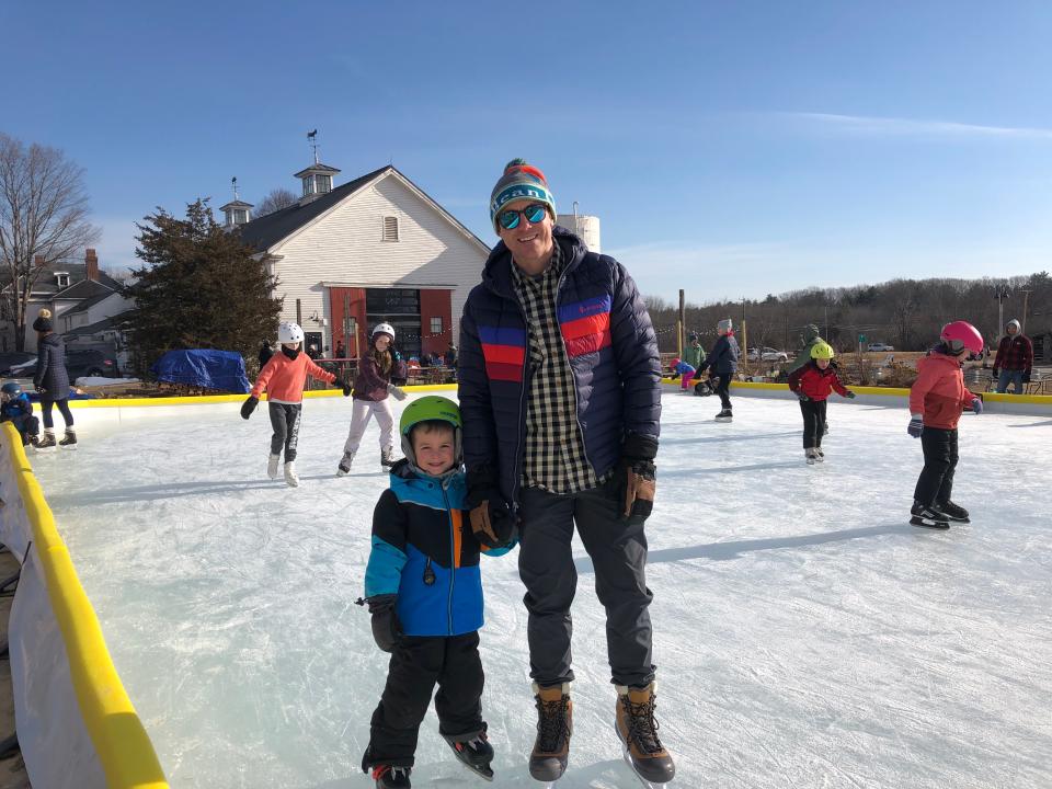 Hampton's Ian Frederick and his son Ryan, 4, took the weekend off from skiing to check out the new outdoor rink at Throwback Brewery Sunday.