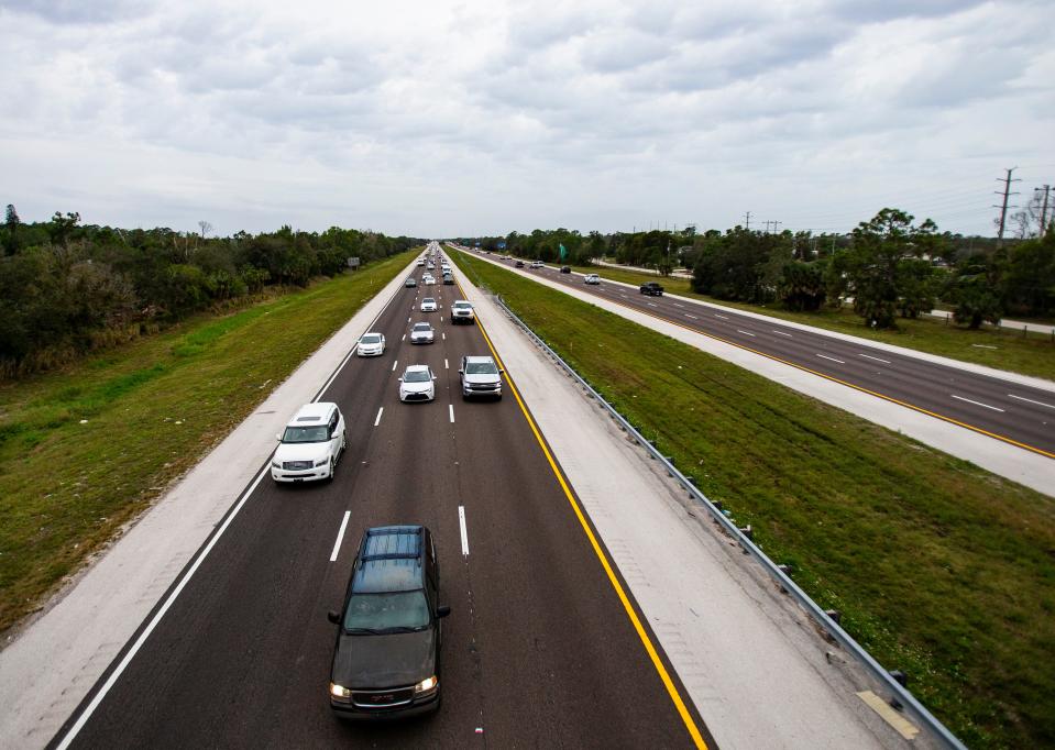 Traffic travels northbound on I-75 toward Fort Myers as seen from the East Terry Street overpass in Bonita Springs on Tuesday, Jan. 9, 2024.