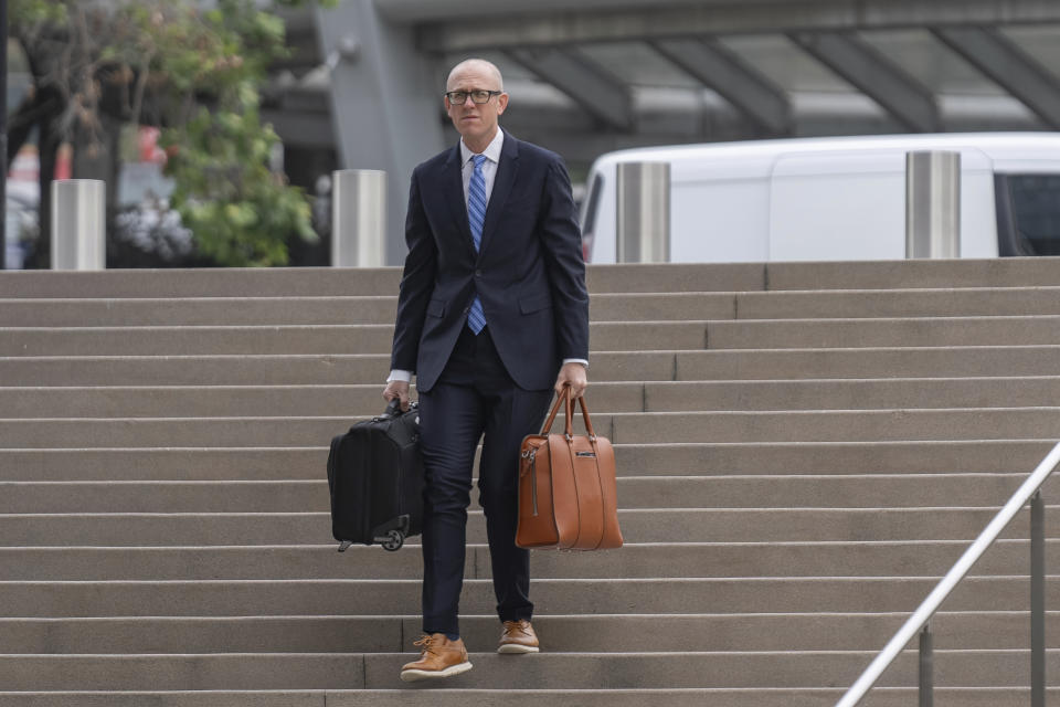 Federal prosecutor Leo Wise arrives at federal court Wednesday, May 22, 2024, in Los Angeles. Hunter Biden's lawyers are pressing a judge to delay his federal tax trial set to begin next month in Los Angeles. (AP Photo/Damian Dovarganes)