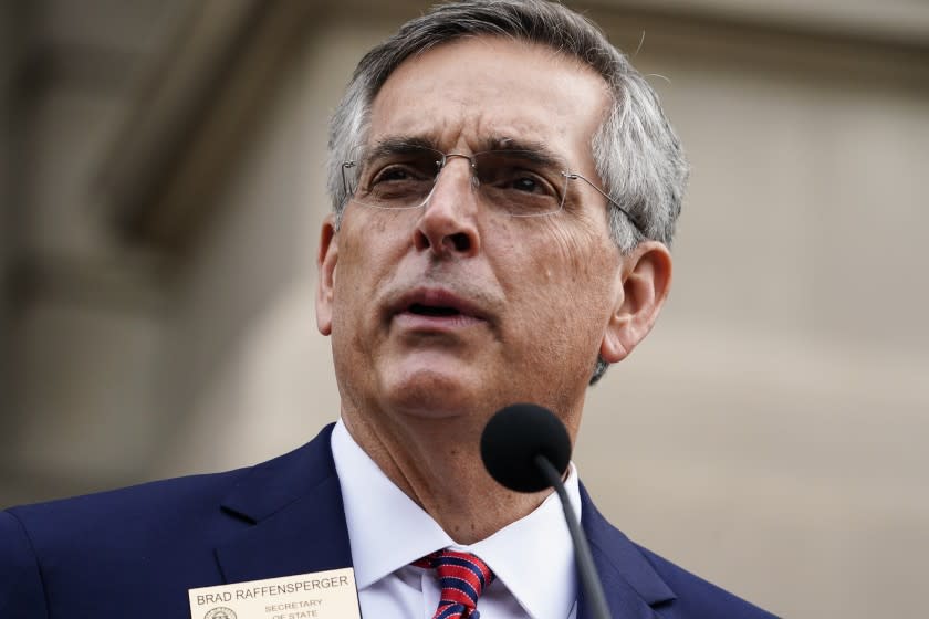 Georgia Secretary of State Brad Raffensperger speaks during a news conference on Wednesday, Nov. 11, 2020, in Atlanta. Georgia election officials have announced an audit of presidential election results that will trigger a full hand recount. (AP Photo/Brynn Anderson)