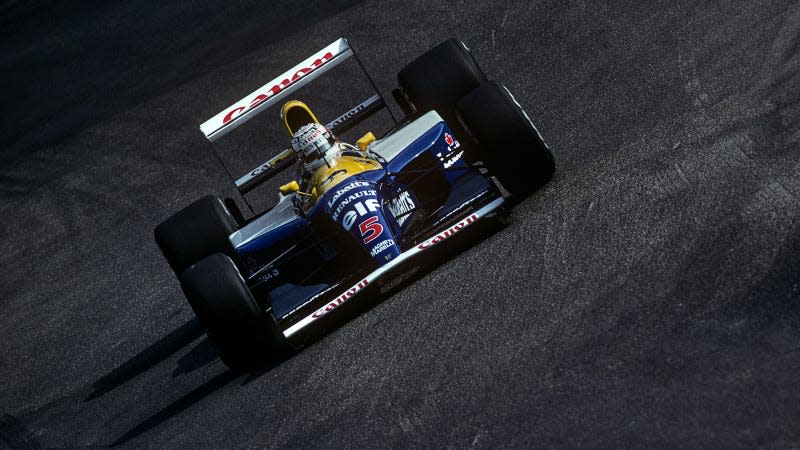 A photo of the blue, yellow and white Williams-Renault FW14B F1 car. 