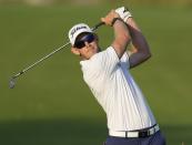 Joachim B. Hansen of Denmark plays a shot on the 14th fairway during first round of the Dubai Desert Classic golf tournament in Dubai, United Arab Emirates, Thursday, Jan. 27, 2022. (AP Photo/Kamran Jebreili)