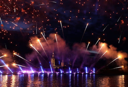 Fireworks explode over the Peter and Paul Fortress during the Scarlet Sails festivities marking school graduation, in St. Petersburg, Russia,June 24, 2018. REUTERS/Henry Romero