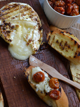 <strong>Get the <a href="http://food52.com/recipes/13956-grilled-brie-topped-with-slow-roasted-sunblushed-tomatoes" target="_blank">Grilled Brie Topped With Slow-Roasted Sunblushed Tomatoes recipe</a> by bellini via Food52</strong>