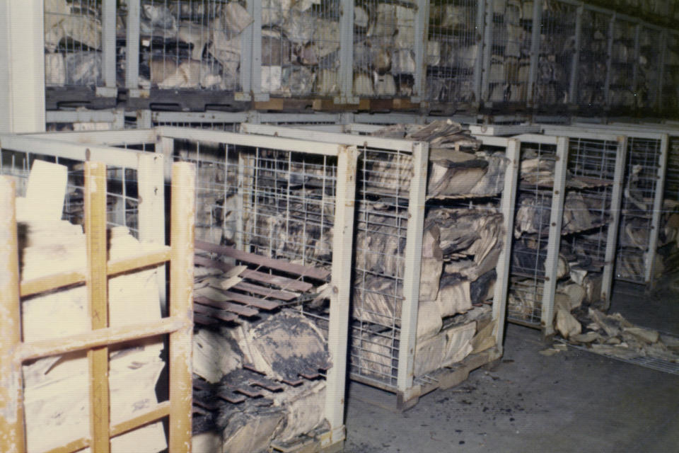This photo provided by the National archives shows damaged records after a massive fire at the Military Personnel Records Center in Overland, Mo., near St. Louis, which started on July 12, 1973. (National Archives via AP)