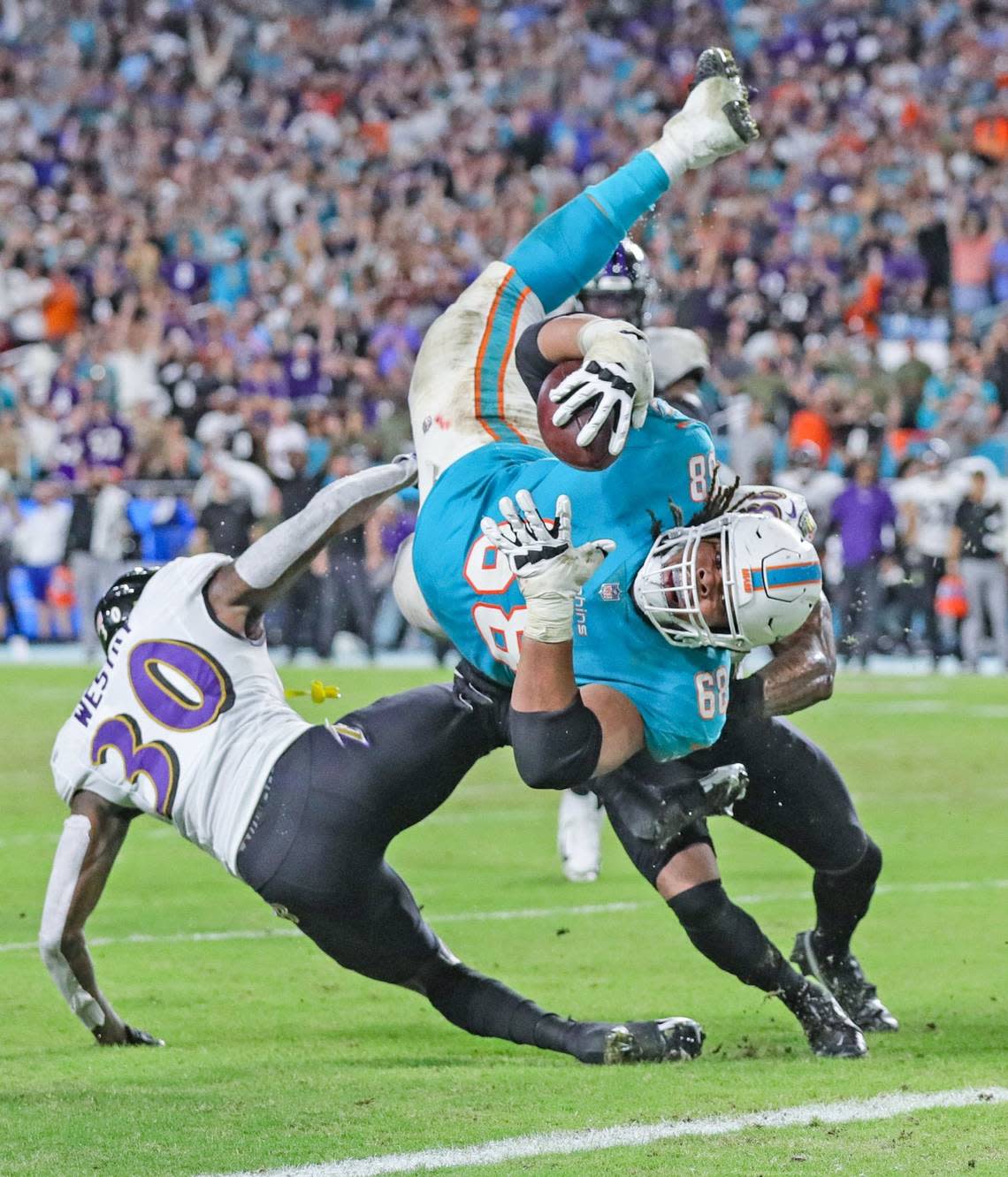 Miami Dolphins guard Robert Hunt (68) dives to the goal line in the fourth quarter but the officials ruled against Miami during game age against the Baltimore Ravens at Hard Rock Stadium on Thursday, November 11, 2021