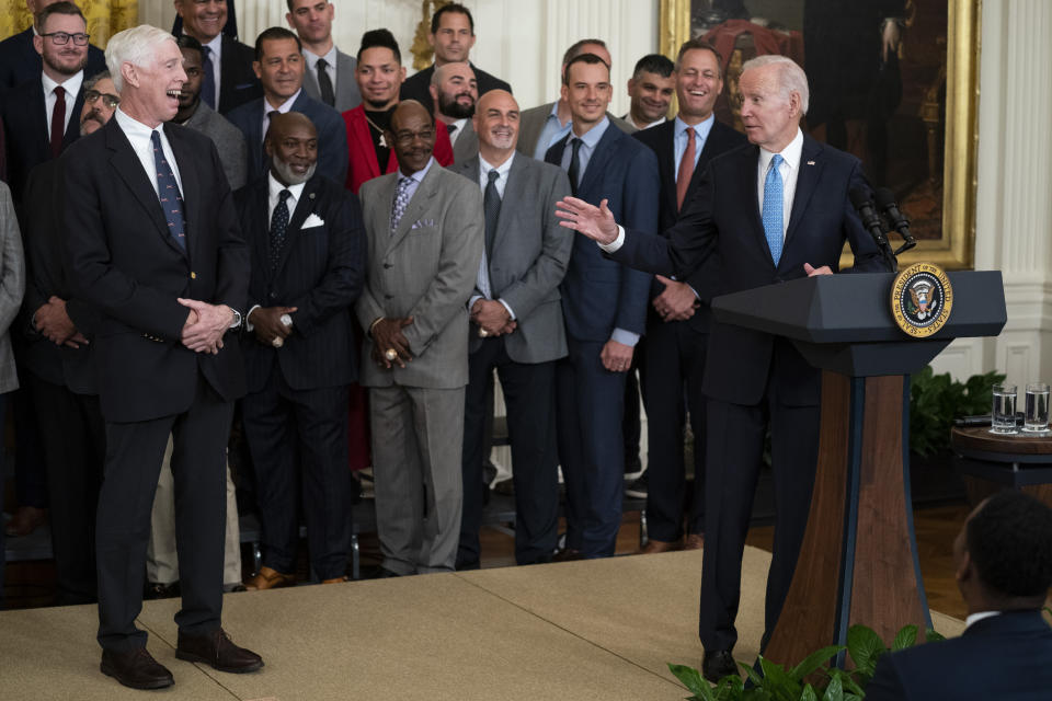 Atlanta Braves President and CEO Terry McGuirk laughs as President Joe Biden speaks during an event celebrating the 2021 World Series champion Atlanta Braves, in the East Room of the White House, Monday, Sept. 26, 2022, in Washington. (AP Photo/Evan Vucci)