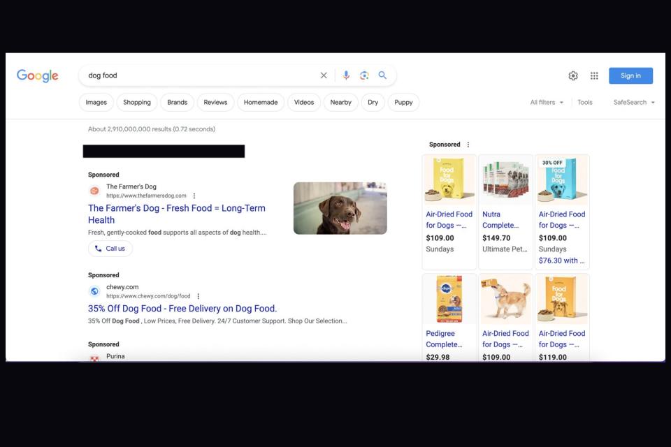 Google search results for "dog food," with a few sponsored links at the top.
