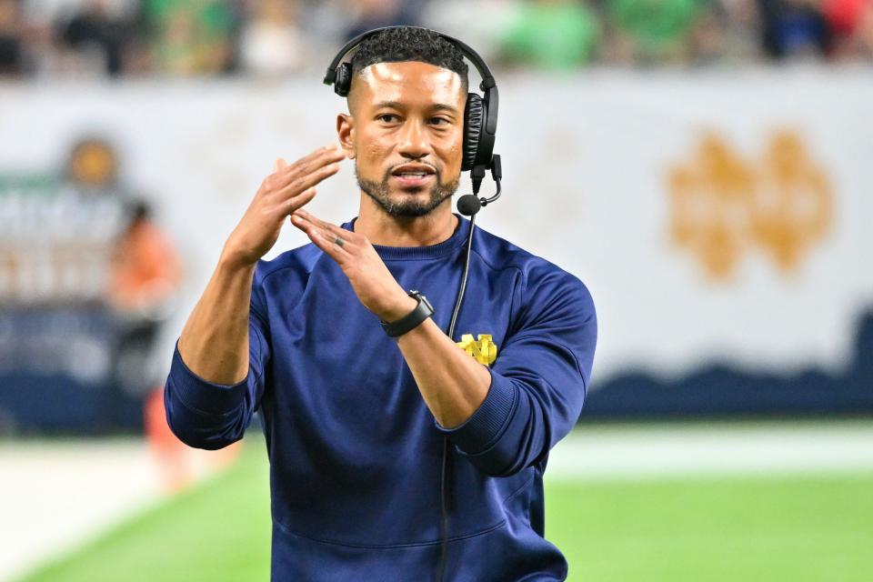 Oct 8, 2022; Paradise, Nevada, USA; Notre Dame Fighting Irish head coach Marcus Freeman signals for a timeout in the second quarter against the BYU Cougars at Allegiant Stadium. Mandatory Credit: Matt Cashore-USA TODAY Sports