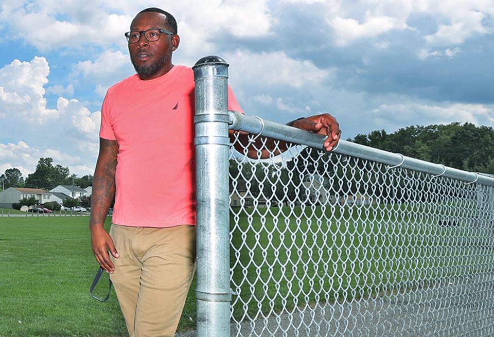 William McWain, a social worker with Minority Behavioral Health at Helen Arnold CLC and a peewee football coach, says the trauma of gun violence "almost becomes normalized, and it shouldn't be that way."