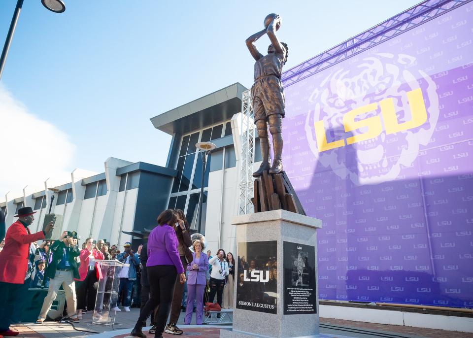 Seimone Augustus's statue is unveiled outside of the Pete Marovich center on the campus of LSU in Baton Rouge.