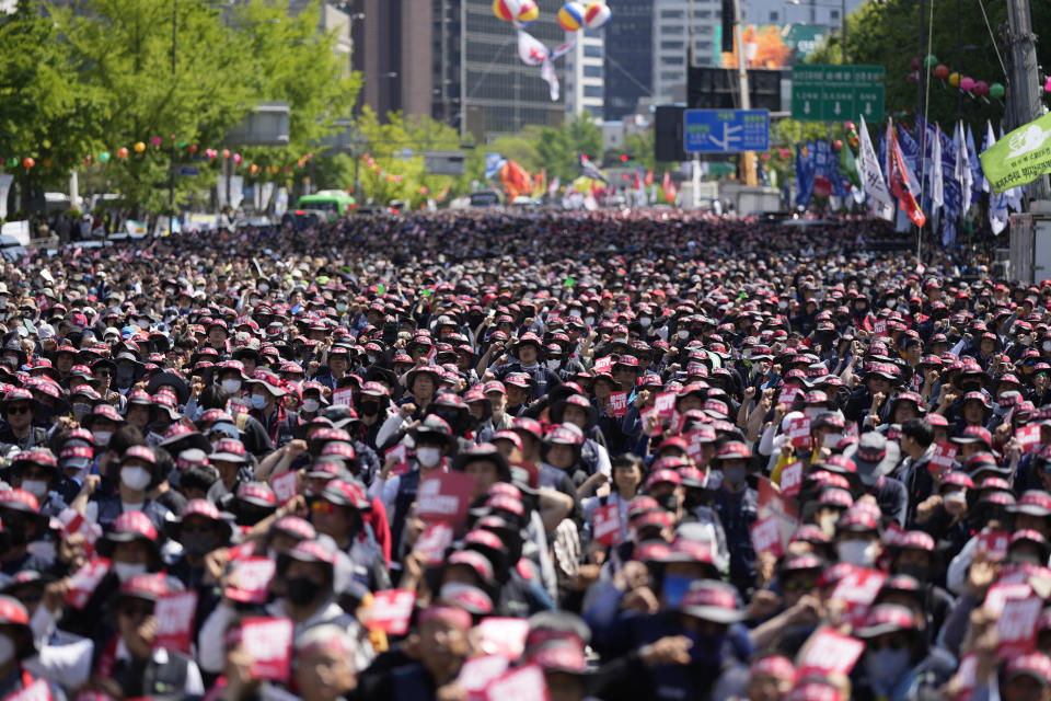 Members of the Korean Confederation of Trade Unions shout slogans during a rally on May Day in Seoul, South Korea, Monday, May 1, 2023. A large number of workers and activists in Asian countries are set to mark May Day on Monday with protests calling for higher salaries and better working conditions, among other demands.(AP Photo/Lee Jin-man)