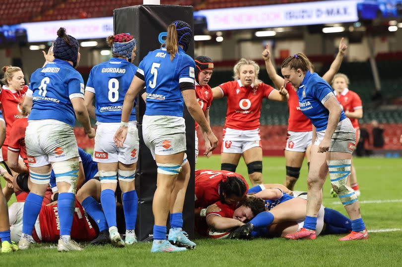 Gwenllian Pyrs forces her way over for Wales' second try -Credit:Gareth Everett/Huw Evans Agency