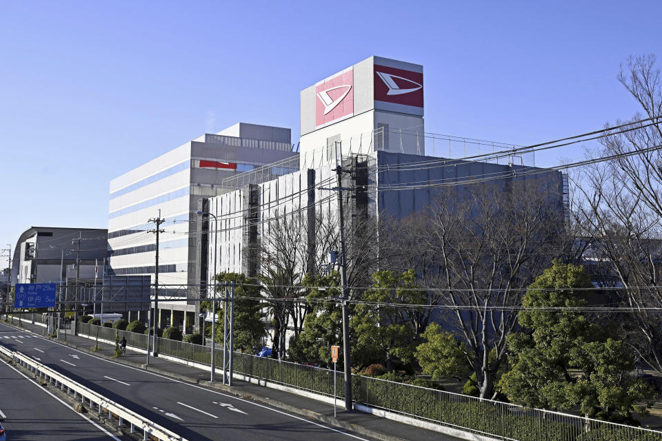 The headquarters of Daihatsu Motor Co. stands in Ikeda, Osaka prefecture, western Japan Tuesday, Dec. 26, 2023. Toyota Motor Corp. subsidiary Daihatsu has shut down production lines at all its four factories Tuesday as transport ministry officials investigate the company’s improper tests for safety certification. (Kyodo News via AP)