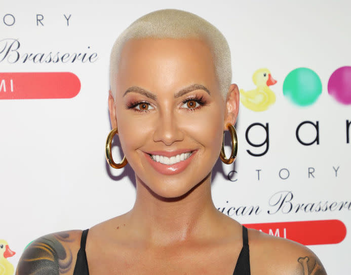 Amber Rose debuted long brown hair, and we're doing a double-take