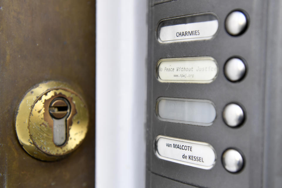 The doorbell on the front door of the office of Belgian NGO 'No Peace without Justice' in Brussels, Friday, Dec. 16, 2022. No one answers the door buzzer at the offices of the two campaign groups linked to a cash-for-influence corruption scandal at the European Union's parliament, allegedly involving Qatari officials. No obvious light shines on what goes on inside their premises. (AP Photo/Geert Vanden Wijngaert)