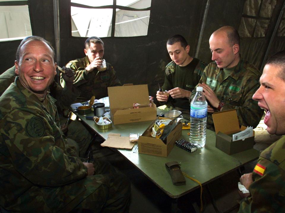 Spanish soldiers eating their MREs in Afghanistan.