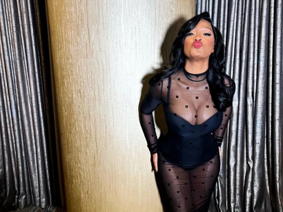 Keke Palmer in a black bodysuit and sheer dress before the Usher concert in Las Vegas on July 4, 2023.