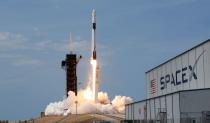 FILE PHOTO: A SpaceX Falcon 9 rocket and Crew Dragon spacecraft carrying NASA astronauts Douglas Hurley and Robert Behnken lifts off
