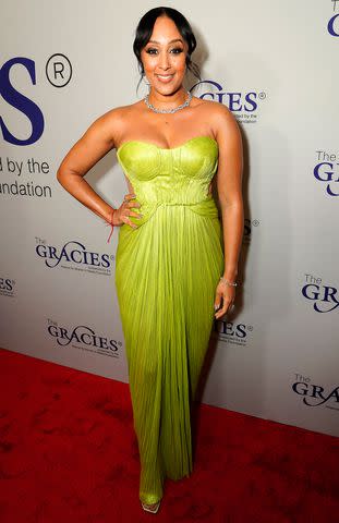 <p>Presley Ann/Getty Images</p> Tamera Mowry-Housley