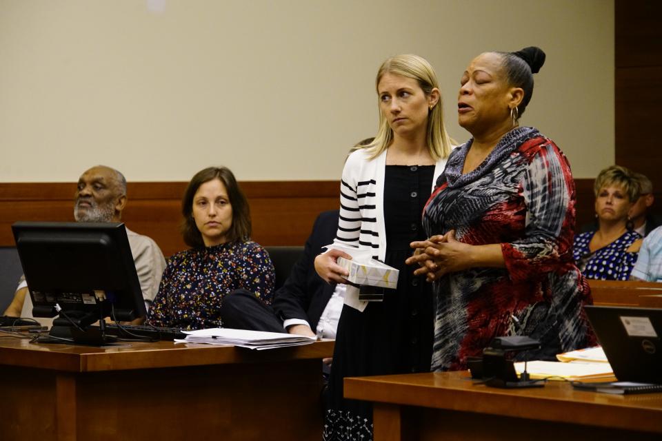 Monretia Crawford, right, the sister of murdered Alma Renee Lake, speaks during a sentencing hearing Wednesday in Franklin County Common Pleas Court for Robert Edwards, 68, of Columbus. Edwards was convicted by a Frankin County jury in the 1991 death of Lake and the 1996 death of Michelle Dawson-Pass.  Crawford said Wednesday in court that no matter what lives the women lived, nobody had the right to kill them.