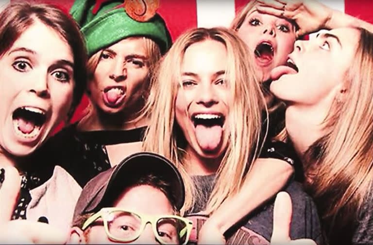 Prince Harry and Princess Eugenie appear in a photobooth picture with Margot Robbie at model Suki Waterhouse's party. (Instagram)