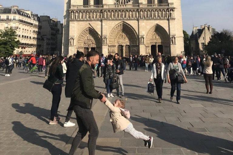 Notre Dame fire: Man in viral 'dad and daughter' picture comes forward