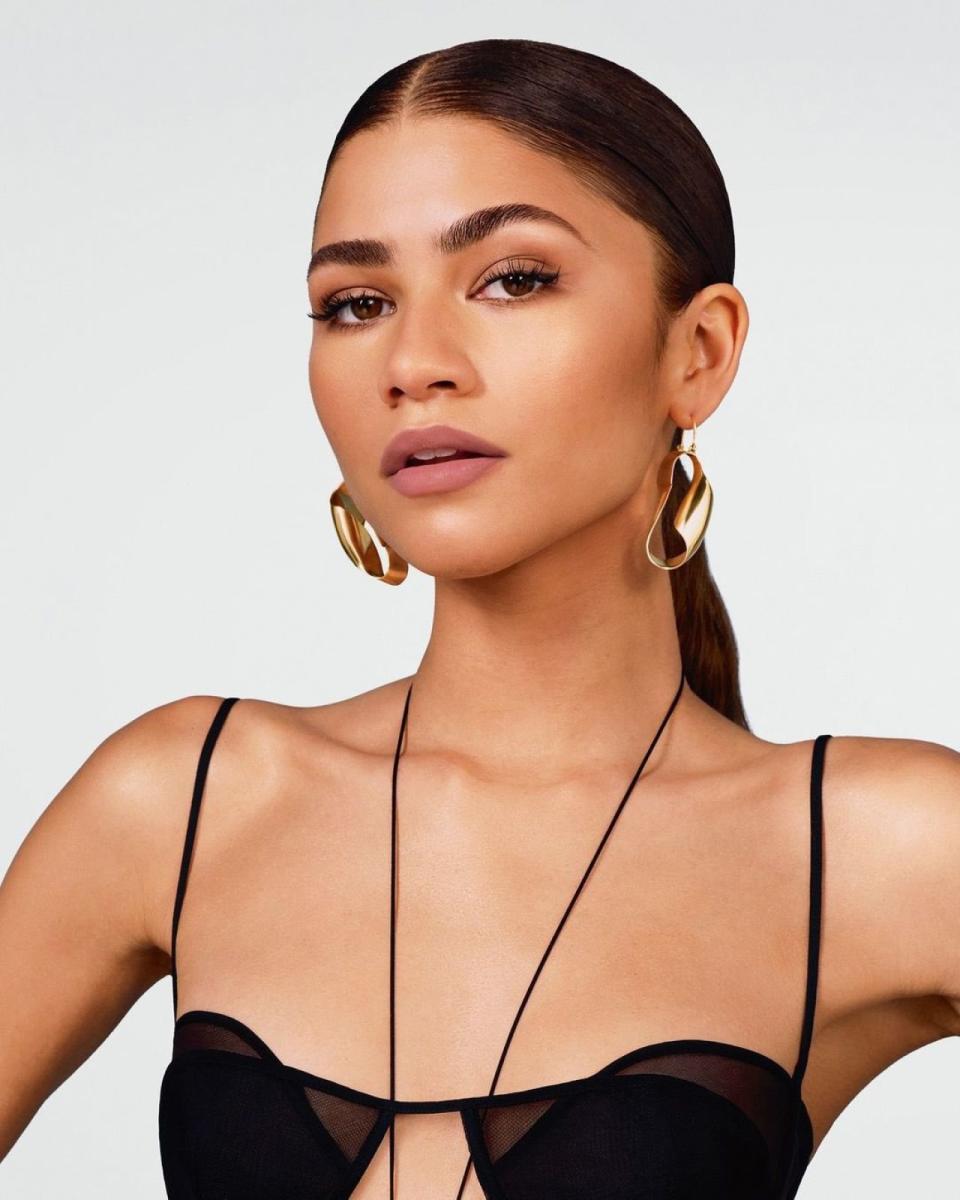 Zendaya wears a bar top from Nensi Dojaka's Fall 2022 collection for the Lancôme L'Absolu Rouge lipstick campaign. 