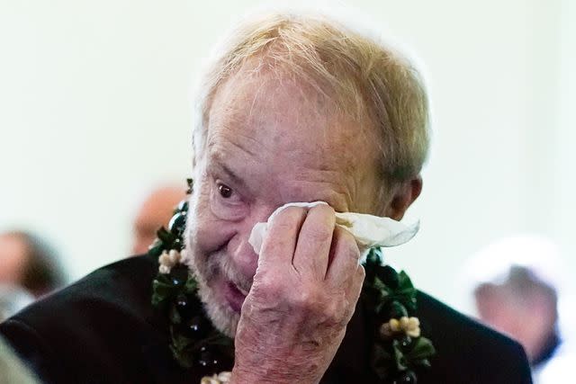 <p>Alex Brandon - Pool/Getty</p> Jeff Carter wipes tears from his eyes as he leaves the funeral for his mother, Rosalynn Carter, on Nov. 29, 2023