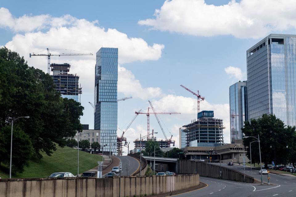 Construction cranes appear in Nashville’s skyline as more development continues  downtown in Nashville, Tenn., Tuesday, June 27, 2023.