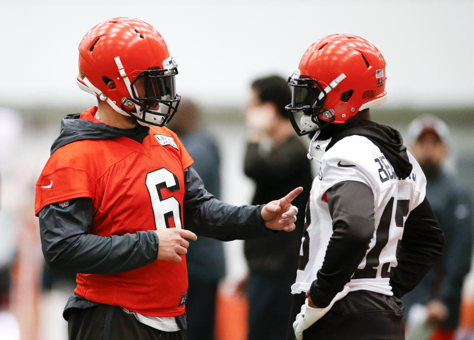 Cleveland Browns quarterback Baker Mayfield, left, came to the defense of teammate Odell Beckham Jr in a recent interview. (AP) 