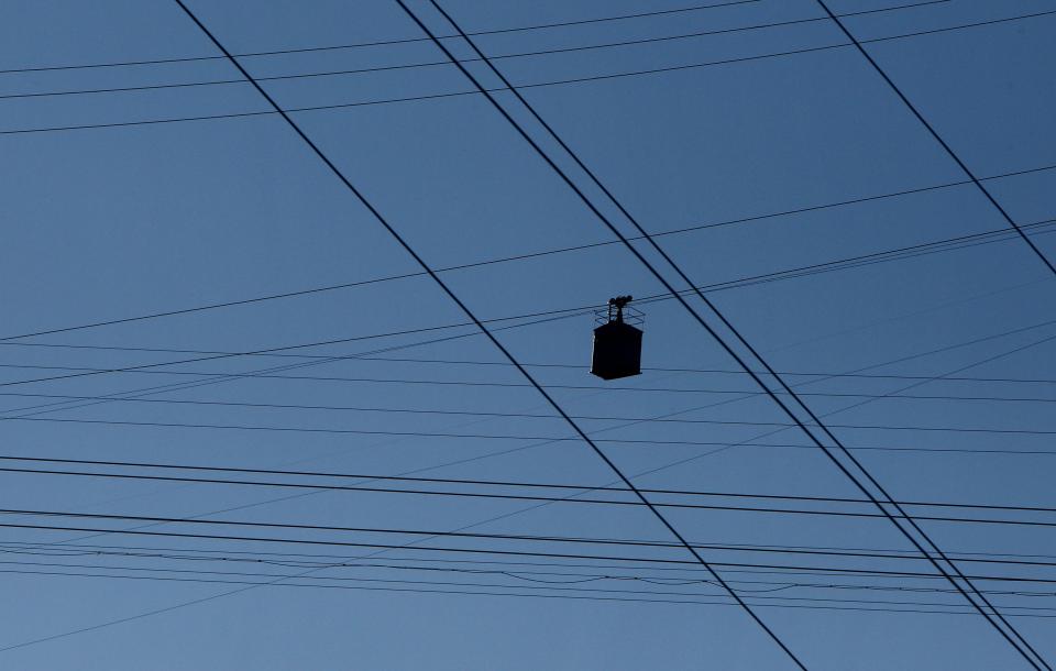 A cable car passes above the town of Chiatura