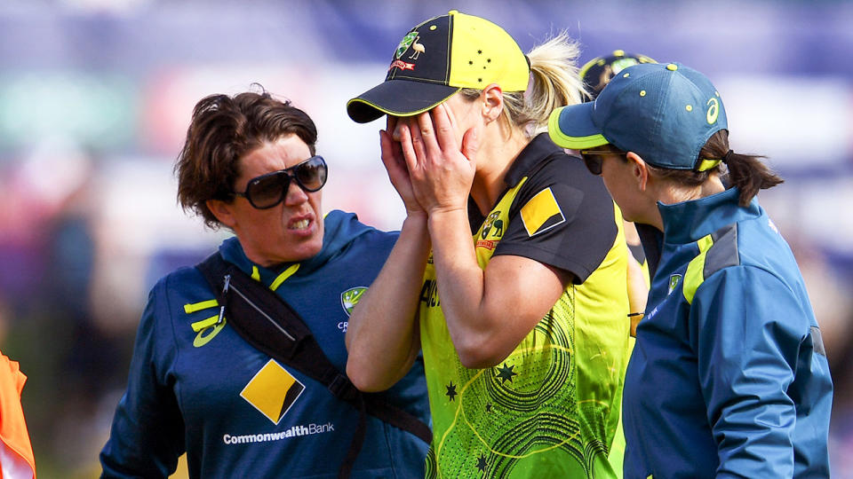 Ellyse Perry upset after a hamstring injury.