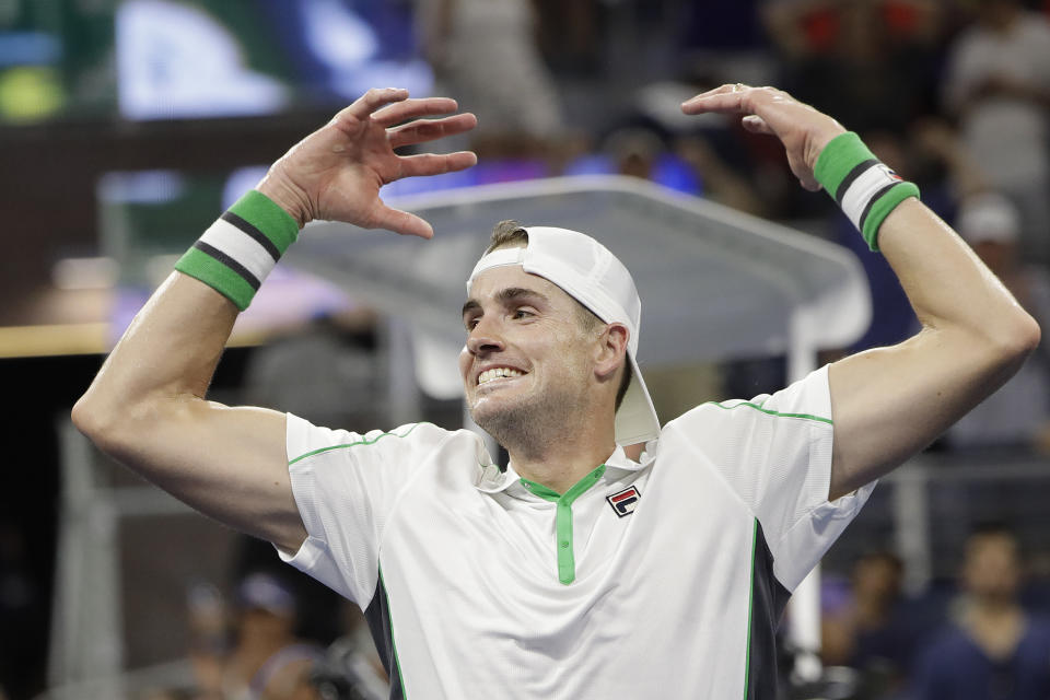 John Isner, of the United States, celebrates after defeating Nicolas Jarry, of Chile, during the second round of the U.S. Open tennis tournament Wednesday, Aug. 29, 2018, in New York. (AP Photo/Jason DeCrow)