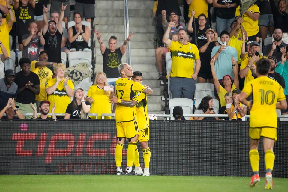 Jul 3, 2024; Columbus, OH, USA; Columbus Crew forward Cucho Hernandez (9) hugs forward Christian Ramirez (17) after he scored a goal during the first half of the MLS soccer game at Lower.com Field. Mandatory Credit: Adam Cairns-The Columbus Dispatch