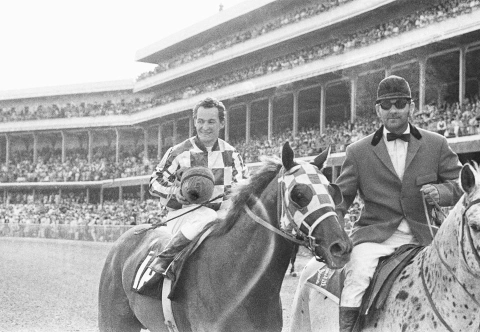 Jockey Ron Turcotte in Winner's Circle at Churchill Downs in Louisville, Kentucky, May 5, 1973, after Turcotte rode Secretariat to a record win in the 99th Kentucky Derby. (AP Photo)