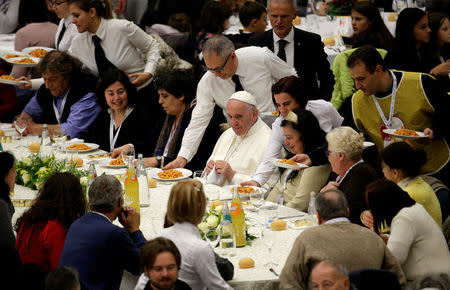 Pope Francis has lunch with the poor following a special mass to mark the new World Day of the Poor in Paul VI's hall at the Vatican, November 19, 2017. REUTERS/Max Rossi