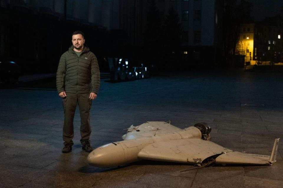 Ukrainian President Volodymyr Zelenskyy stands near a downed Russian kamikaze drone in Kyiv, Ukraine, on Oct. 27, 2022. (Ukrainian Presidential Office/Handout/Anadolu Agency via Getty Images)