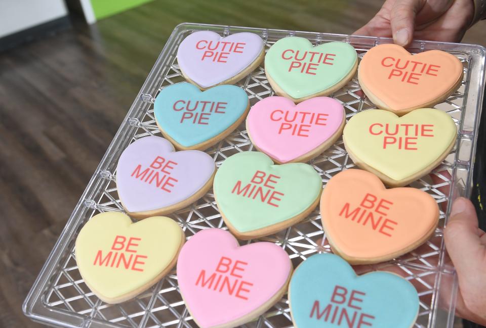 These are treats at Sugah Cakes in Spartanburg that can help fill your Valentine's Day gift needs. This is owner Melissa Bearden of Sugah Cakes in Spartanburg holding some Valentine's Day treats for guests. 