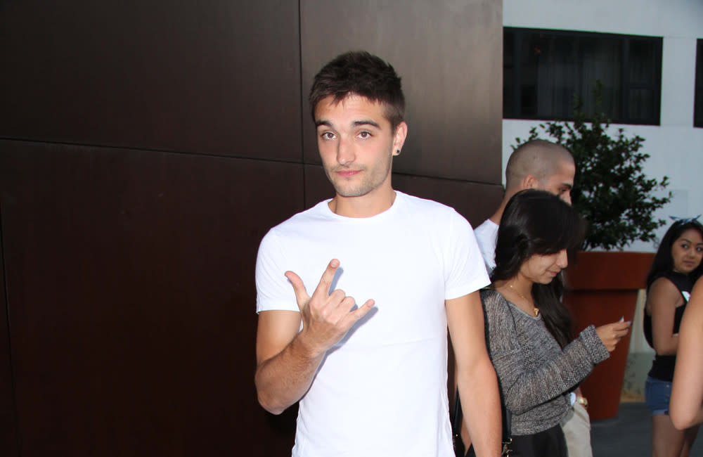 Max George says it was 'an honour' to carry Tom Parker's coffin credit:Bang Showbiz