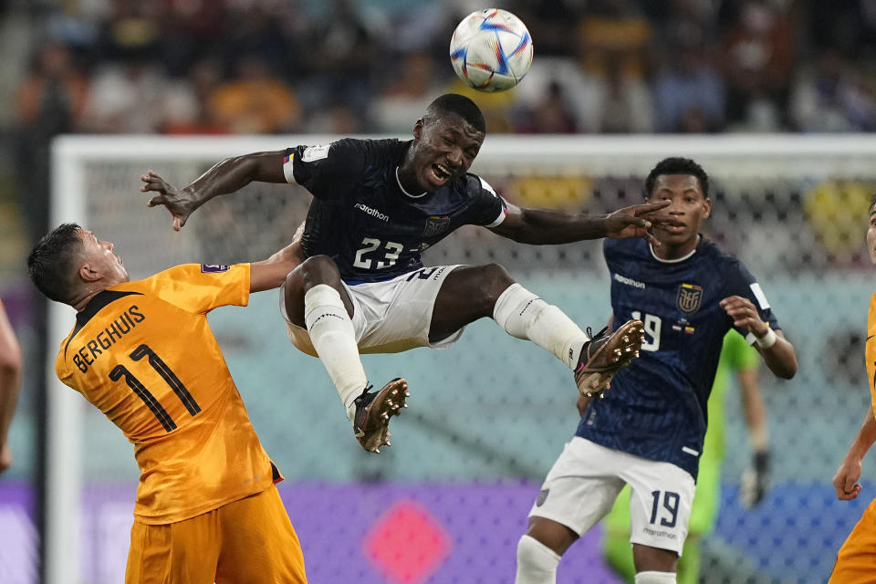 Ecuador's Moises Caicedo,centre, jumps to head the ball during the World Cup group A soccer match between the Netherlands and Ecuador, at the Khalifa International Stadium in Doha, Qatar, Friday, Nov. 25, 2022. (AP Photo/Martin Meissner)