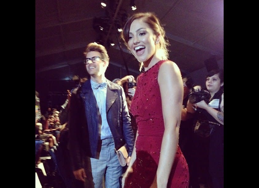 Minka Kelly and Brad Goreski take their seats in the front row.