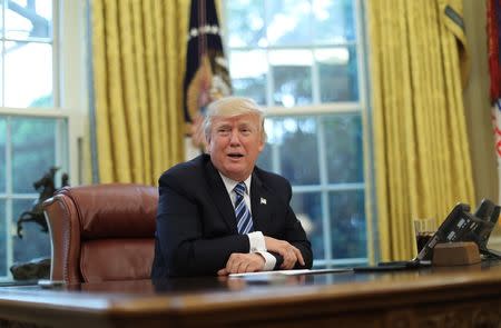 U.S. President Donald Trump speaks during an interview with Reuters in the Oval Office of the White House in Washington, U.S., April 27, 2017. REUTERS/Carlos Barria