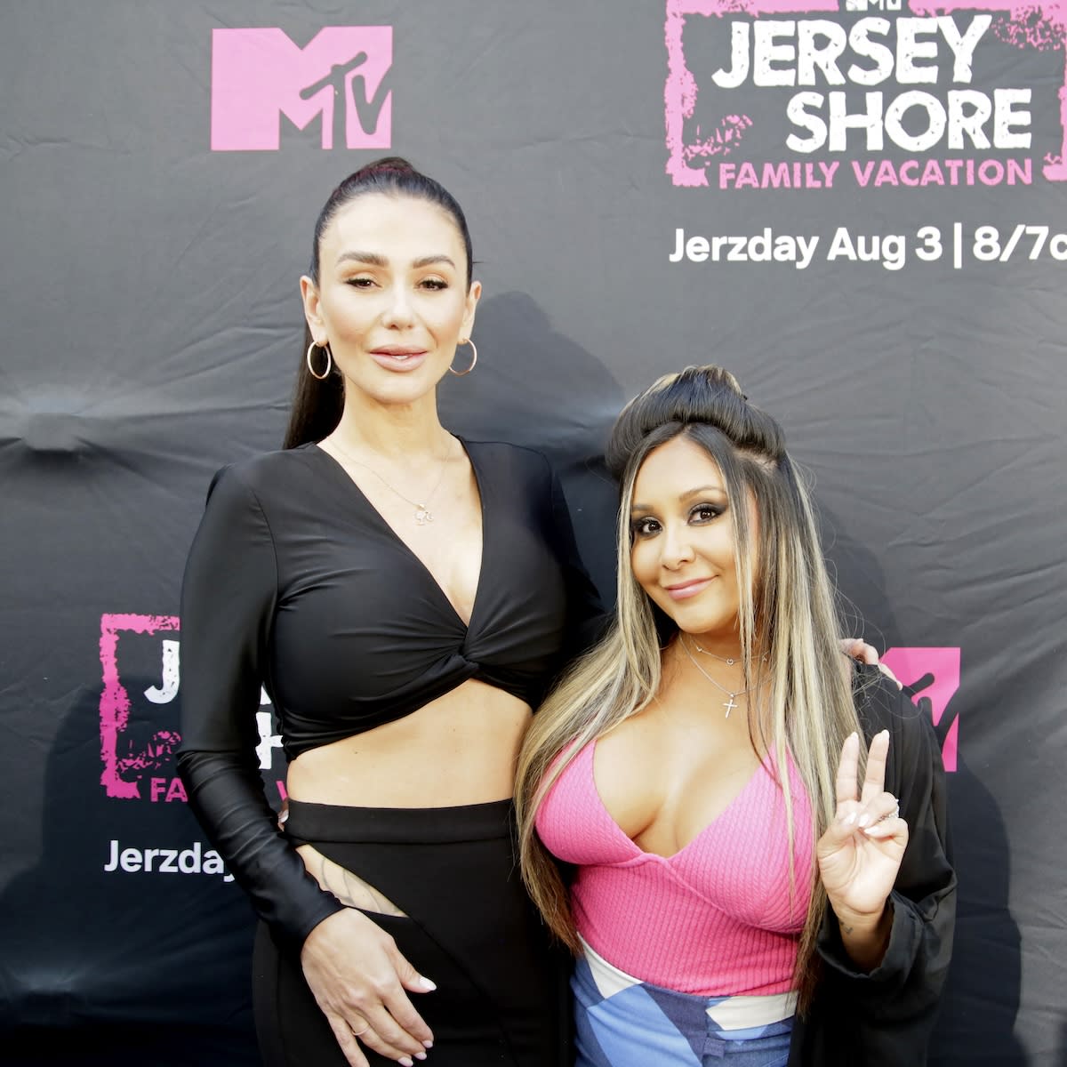 Business owners and reality TV stars Jenni 'JWoww' Farley and Nicole 'Snooki' Polizzi pose together.