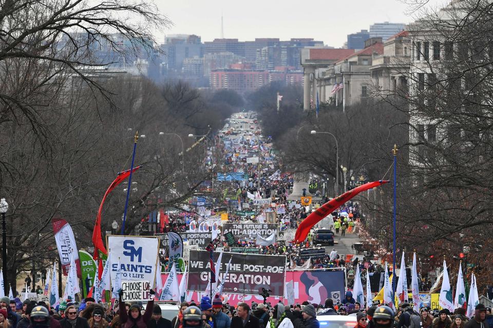 Pro-life activists take part in the 49th annual March for Life, on January 21, 2022, in Washington, DC. The march takes place every year on the anniversary of US Supreme Court decision of Roe v. Wade in 1973. The march drew a large crowd in 2022 as the US Supreme Court turns its attention to a Mississippi abortion case that could affect the legality of abortion across the nation. 